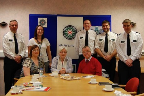 Neighbourhood watch co-ordinators discuss concerns and issues in their local area  with Officers from Newry Neighbourhood South Policing Team, E District's Crime Prevention Officers .